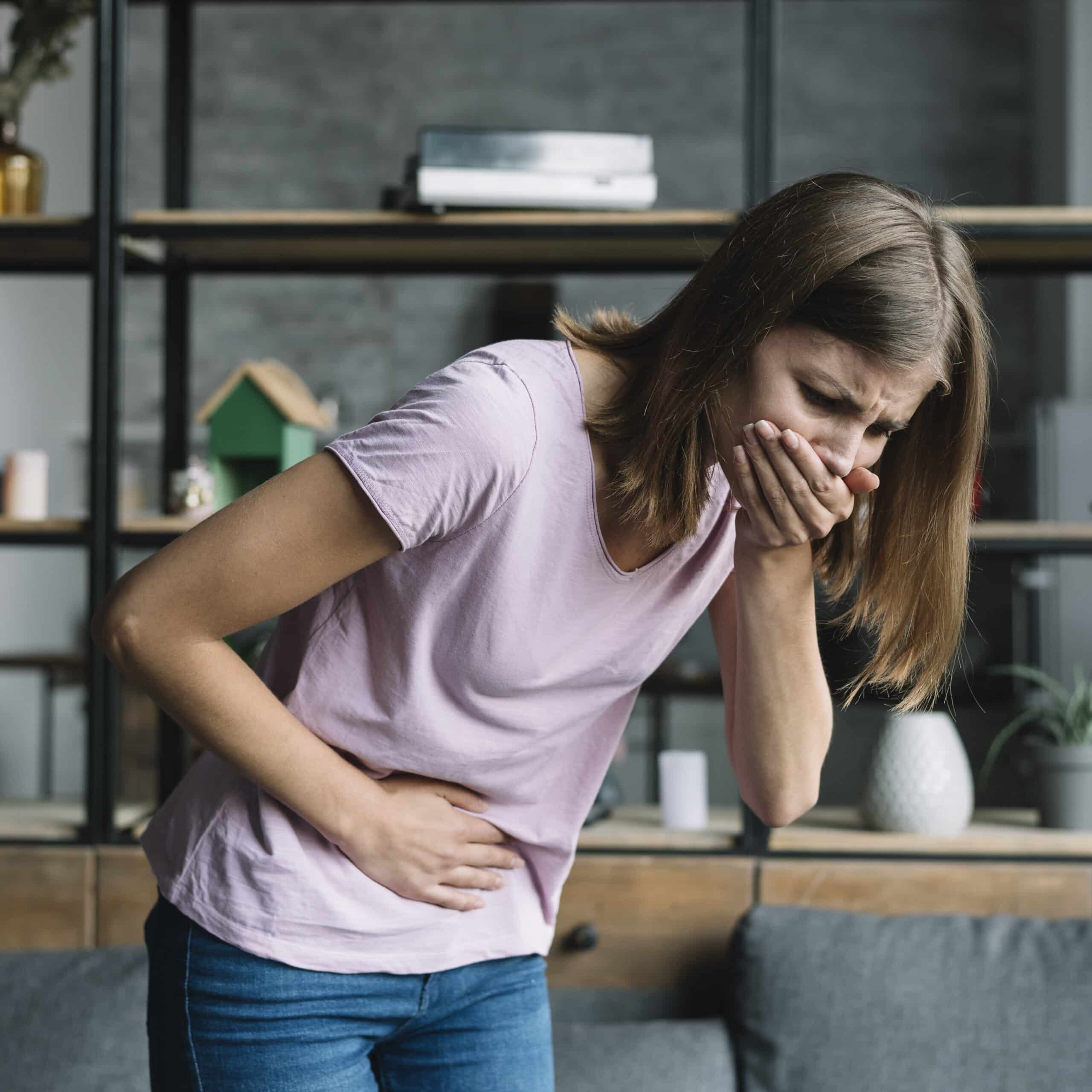 young-woman-with-stomach-pain-suffering-from-nausea <br />
Young woman with stomach pain suffering from nausea